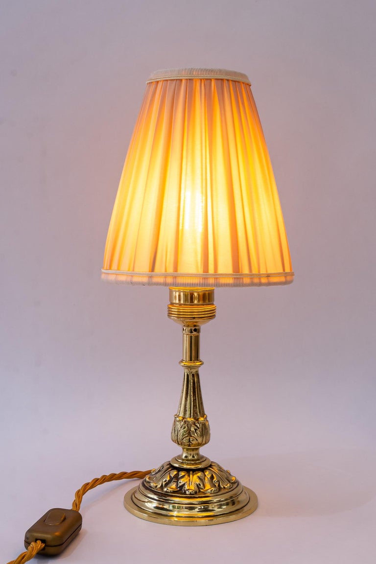 Historistic brass table lamp with fabric shade vienna around 1890s