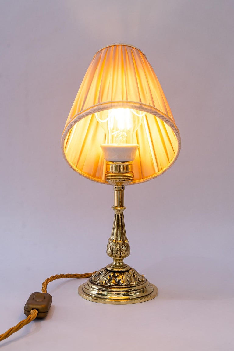 Historistic brass table lamp with fabric shade vienna around 1890s