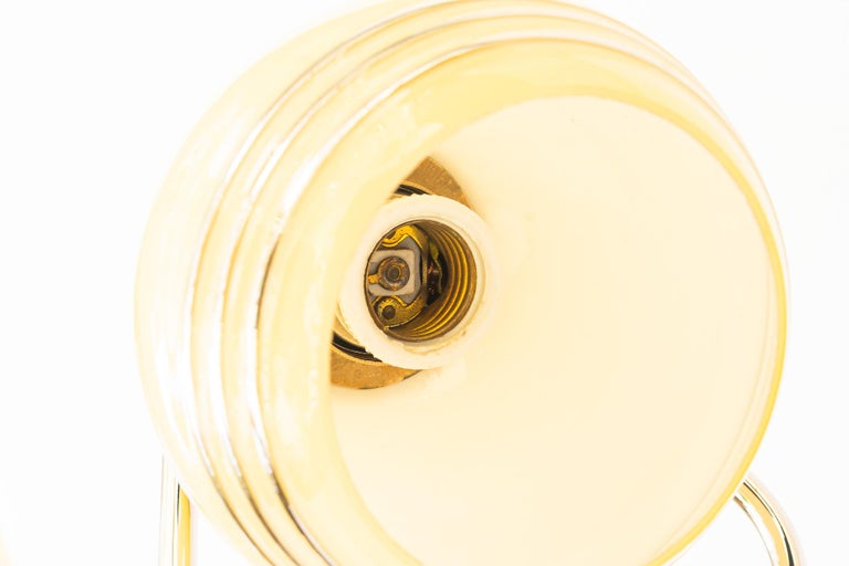 Swiveling Art Deco nickel table lamp with glass vienna around 1920s