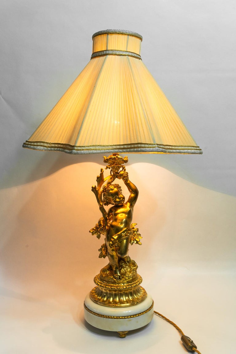 Big Historistic fire gilted bronze table lamp with fabric shade france 1890s