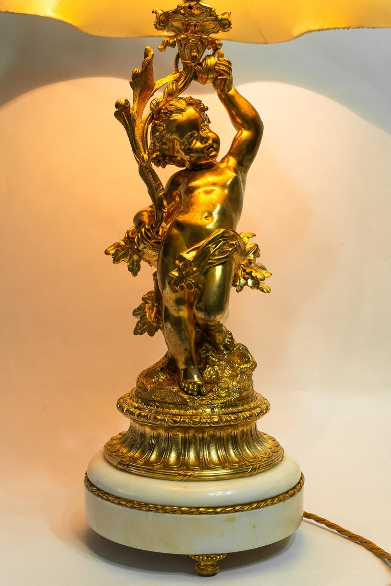Big Historistic fire gilted bronze table lamp with fabric shade france 1890s