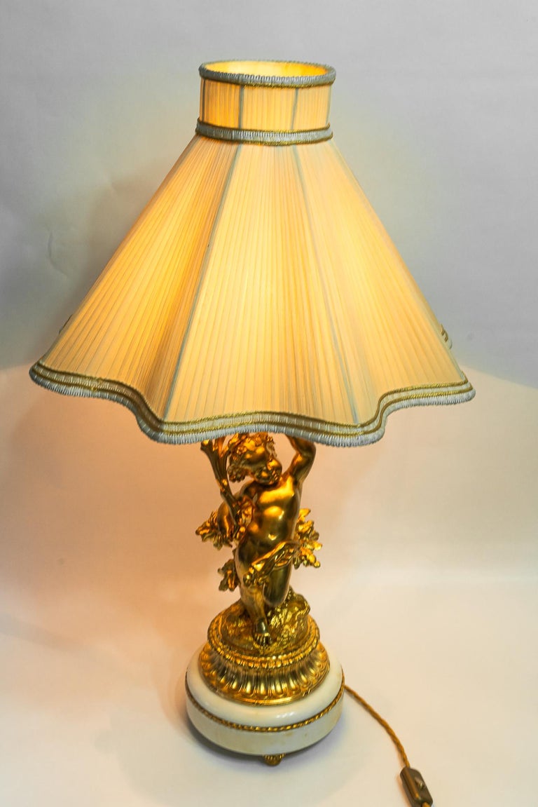 Big Historistic fire gilted bronze table lamp with fabric shade france 1890s