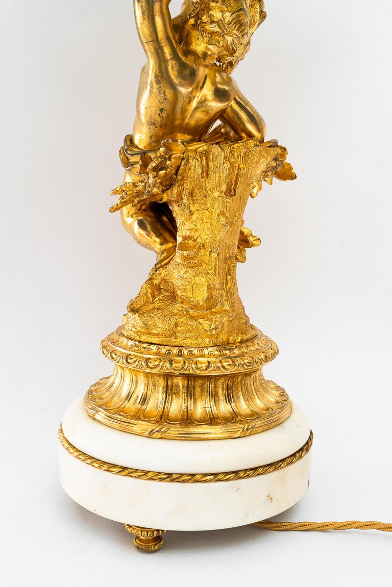 Big Historistic fire gilted bronze table lamp with fabric shade france 1890s