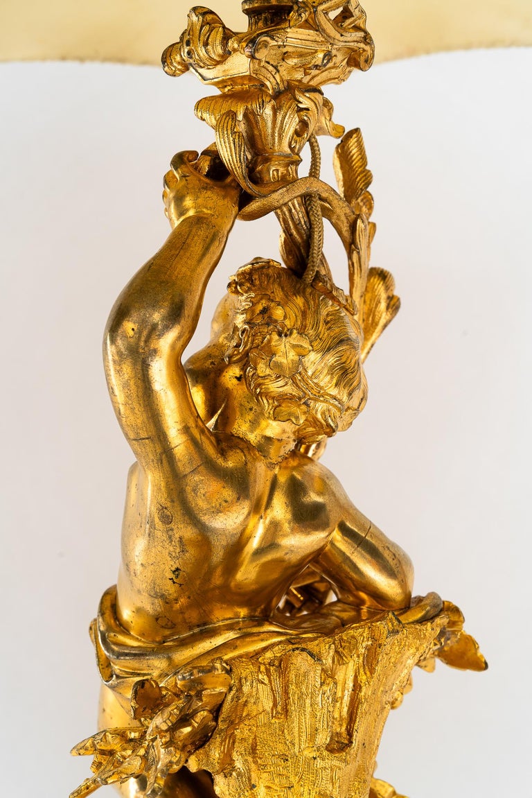 Big Historistic fire gilted bronze table lamp with fabric shade france 1890s