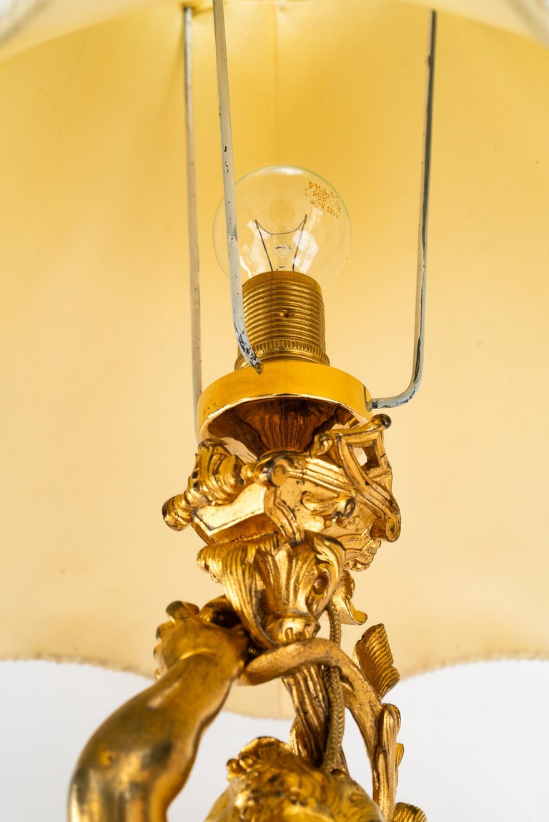 Big Historistic fire gilted bronze table lamp with fabric shade france 1890s