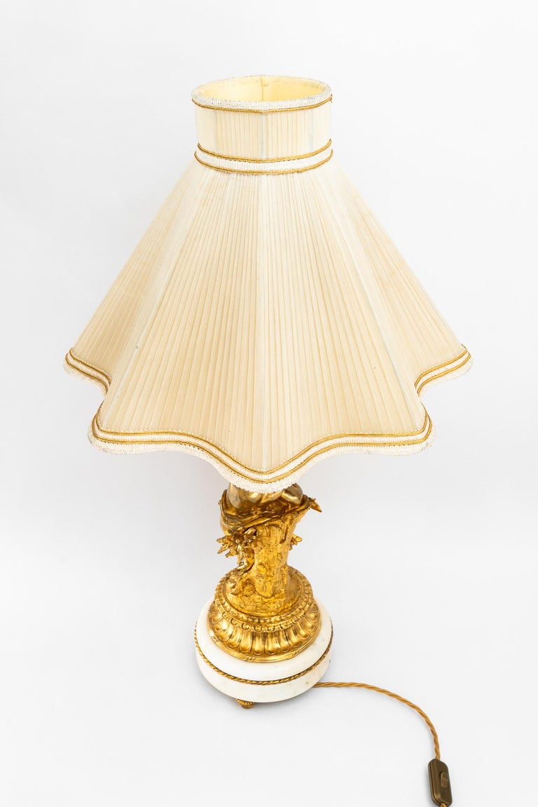 Big Historistic fire gilted bronze table lamp with fabric shade france 1890s