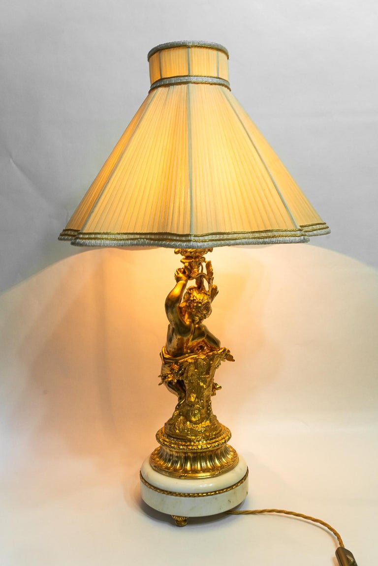 Big Historistic fire gilted bronze table lamp with fabric shade france 1890s