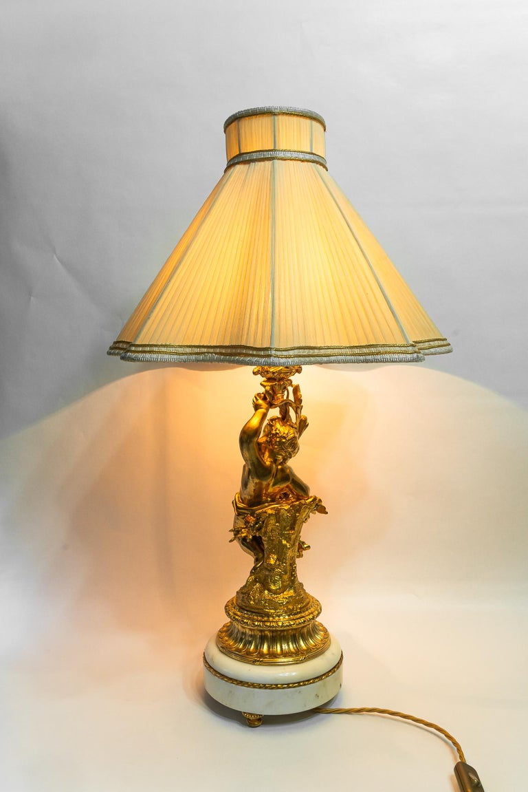 Big Historistic fire gilted bronze table lamp with fabric shade france 1890s