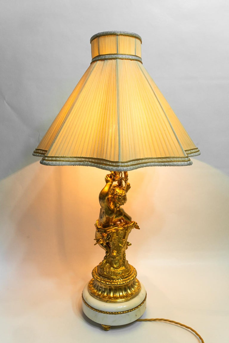Big Historistic fire gilted bronze table lamp with fabric shade france 1890s