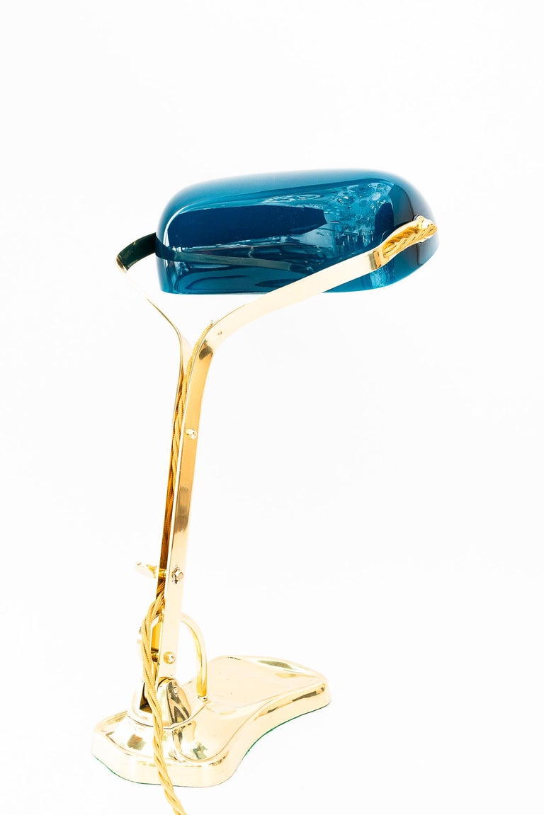 Swiveling Art Deco banker table lamp with glass shade around 1920s