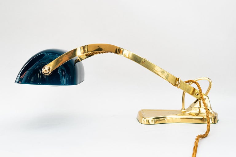 Swiveling Art Deco banker table lamp with glass shade around 1920s