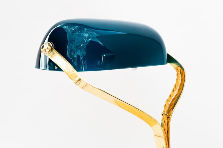 Swiveling Art Deco banker table lamp with glass shade around 1920s