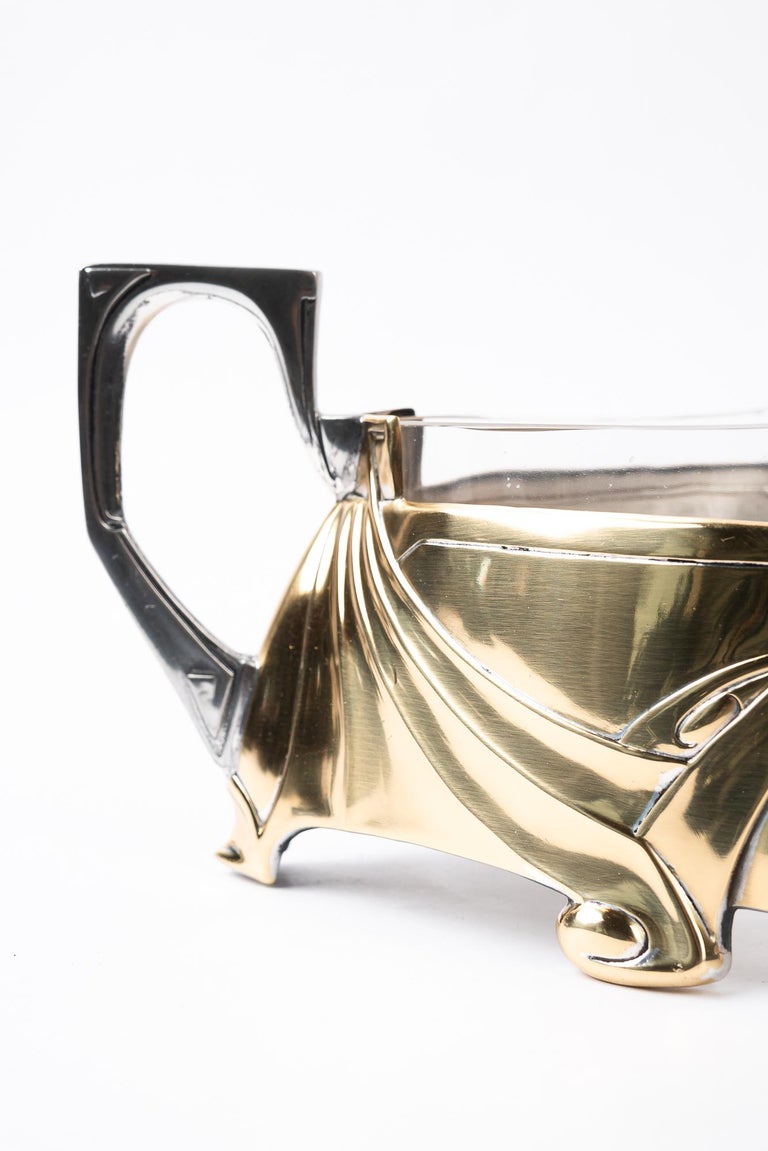 Jugendstil centerpiece mad of alpaca and brass with glass around 1908