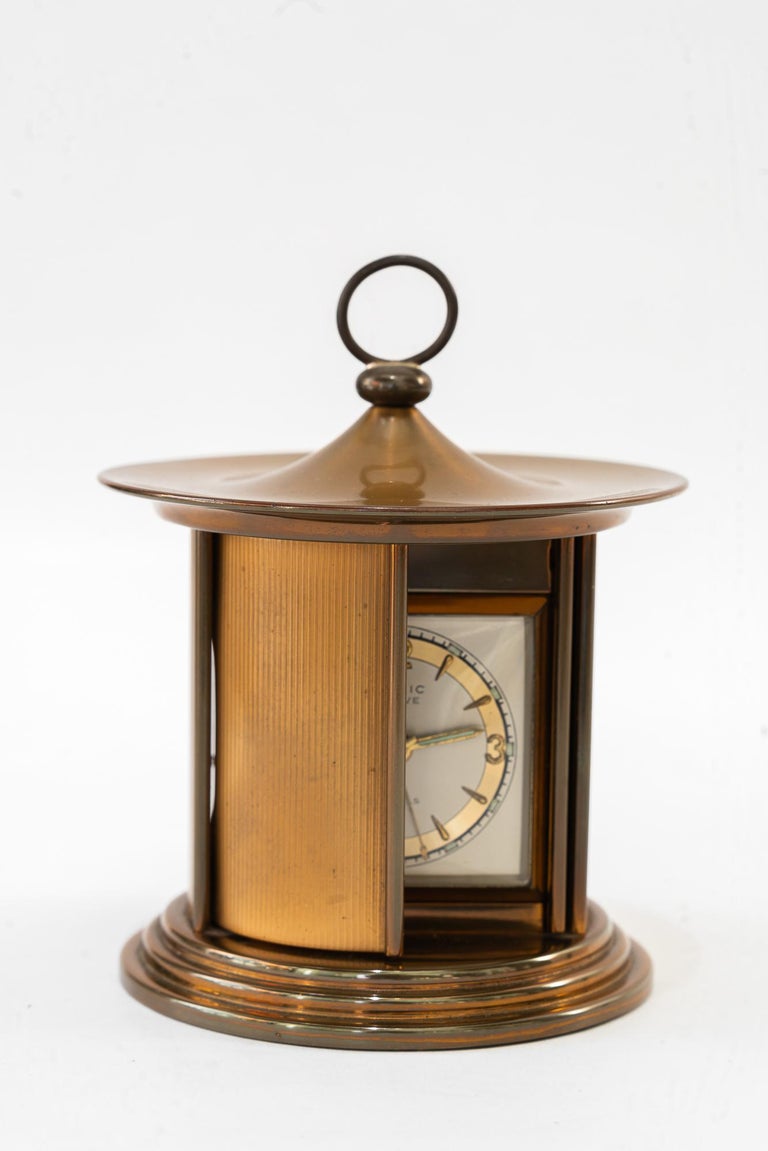 Swiss watch table clock carmic geneve 7 jewels around 1950s