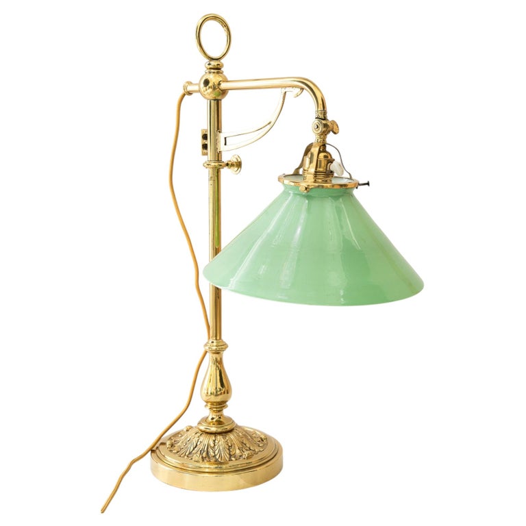 Swiveling and hight adjustable art deco table lamp with original opal glass 1920