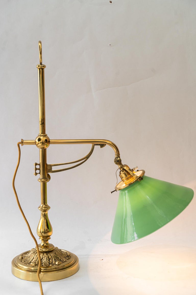 Swiveling and hight adjustable art deco table lamp with original opal glass 1920