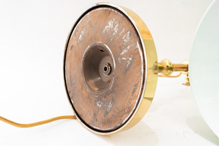 Swiveling and hight adjustable art deco table lamp with original opal glass 1920
