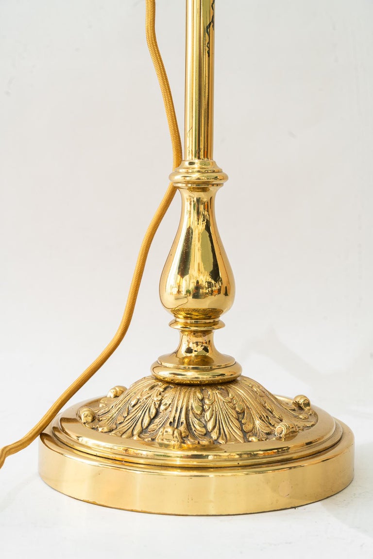 Swiveling and hight adjustable art deco table lamp with original opal glass 1920