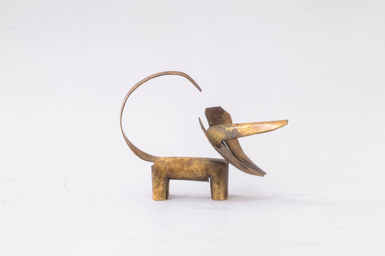 Very small brass sheet metal dog by rohac ( signed, last picture ) around 1950s