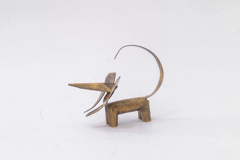 Very small brass sheet metal dog by rohac ( signed, last picture ) around 1950s